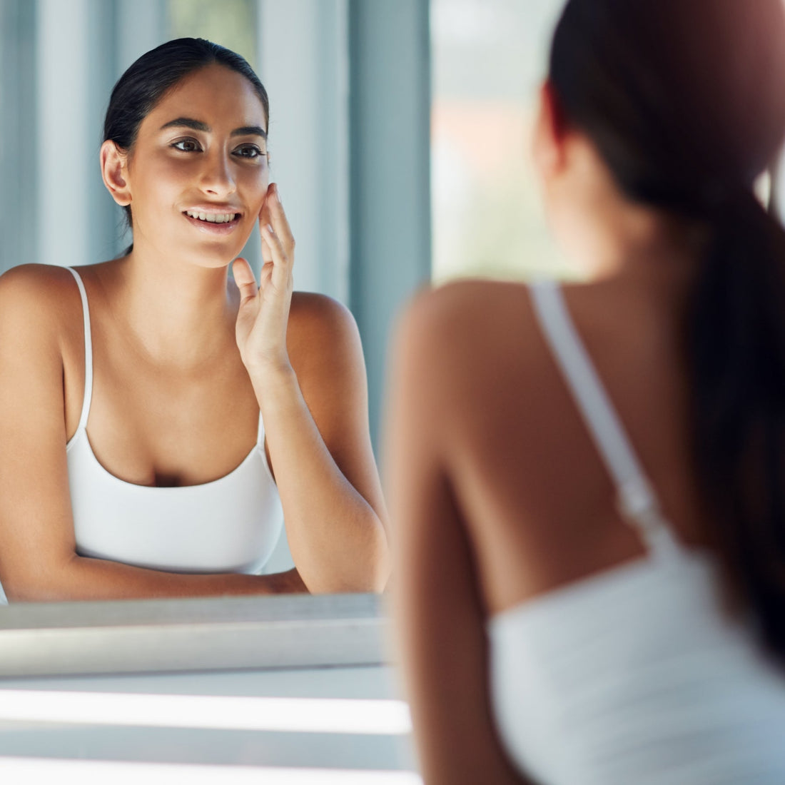 Woman using natural waterless cleansing balm