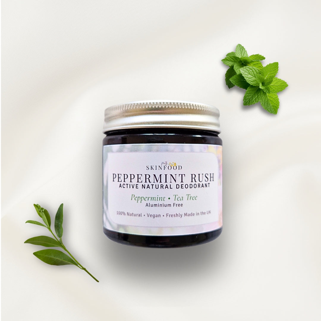My Skinfood Peppermint Rush active deodorant jar with mint leaves on a light background