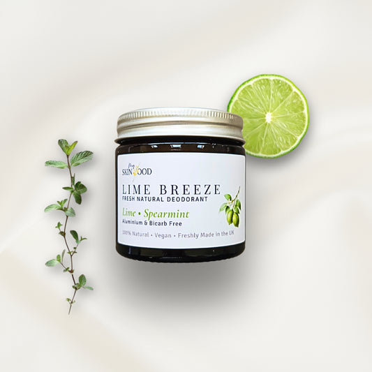 Jar of My Skinfood Lime Breeze natural aluminium free deodorant with a lime and mint leaves on a light background