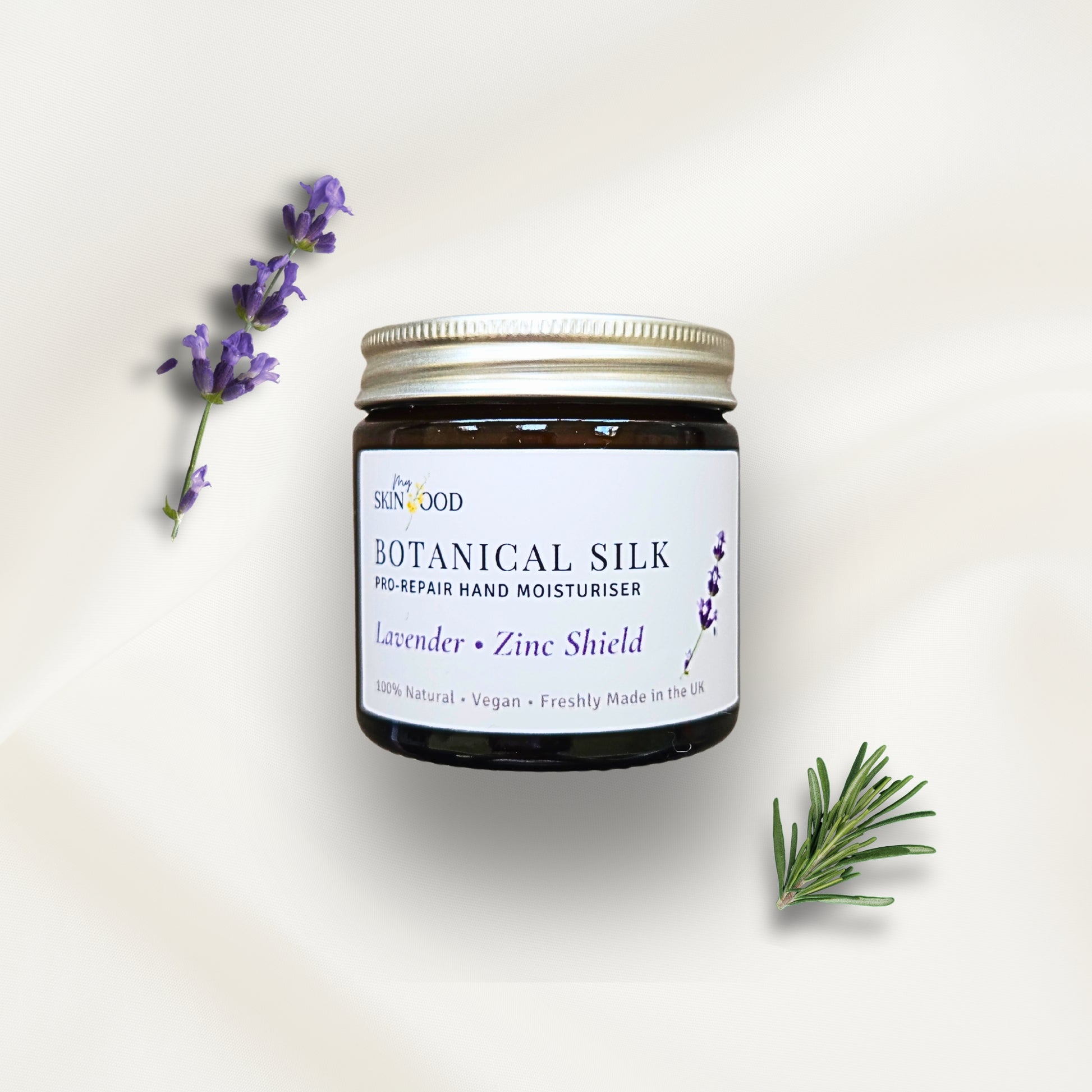 Jar of My Skinfood Botanical Silk hand moisturizer with lavender and rosemary eucalyptus on a light background